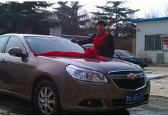 超前涂料獎勵員工轎車，真石漆生產(chǎn)廠家！